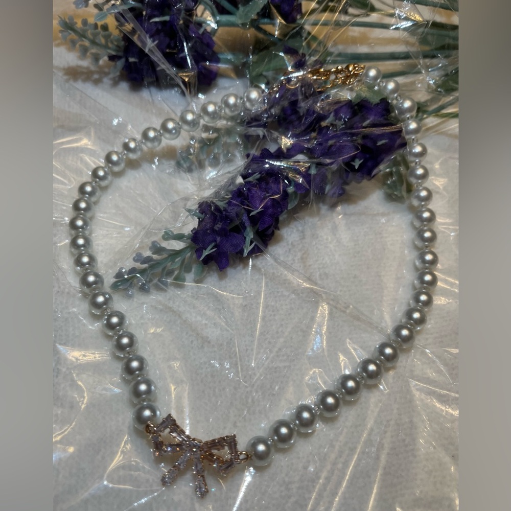# 105 Pearl Necklace